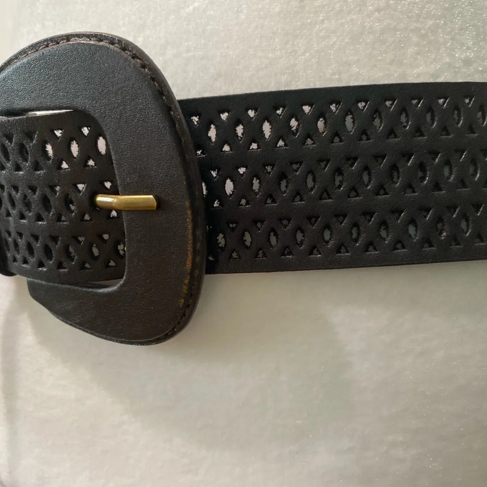Chico’s dark brown leather belt.Size M/L is 42” long